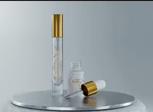 QBio Grow vial, gel, and dropper arranged on a silver platform